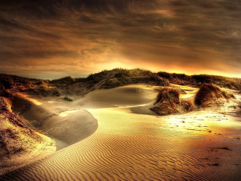 Duinen bij zonsondergang